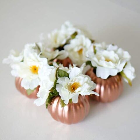 dollar store pumpkins into a gorgeous copper fall centerpiece