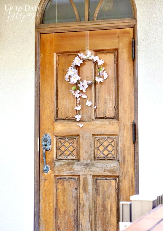 A beautiful wooden Japanese front door with a round top on our military house rental in Japan. 